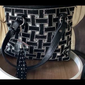 Black leather and bowling bag with polkadot inside and optional Crossbody💕